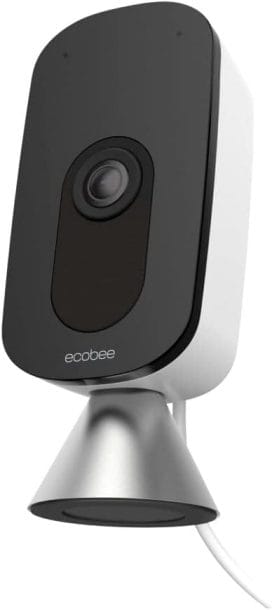 A white and black home security camera on a white background.